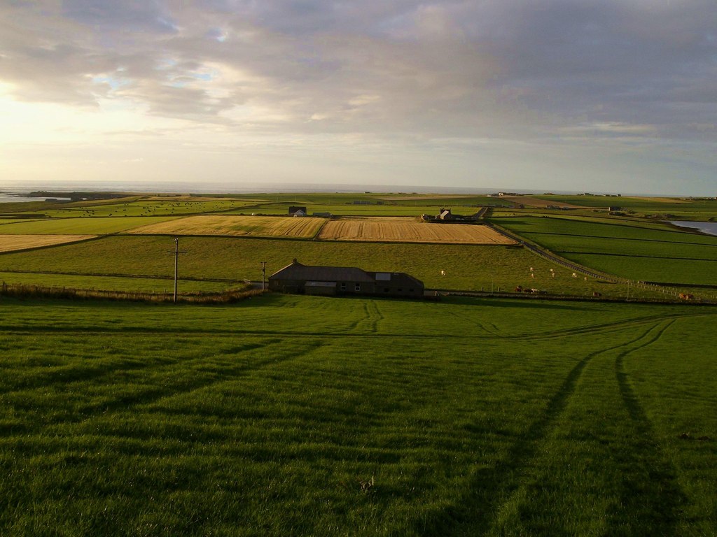 View from above Wheebin standing stone towards the Birsay Outdoor Centre; retained as a contextual view while the direct stone photograph below serves as the lead image.